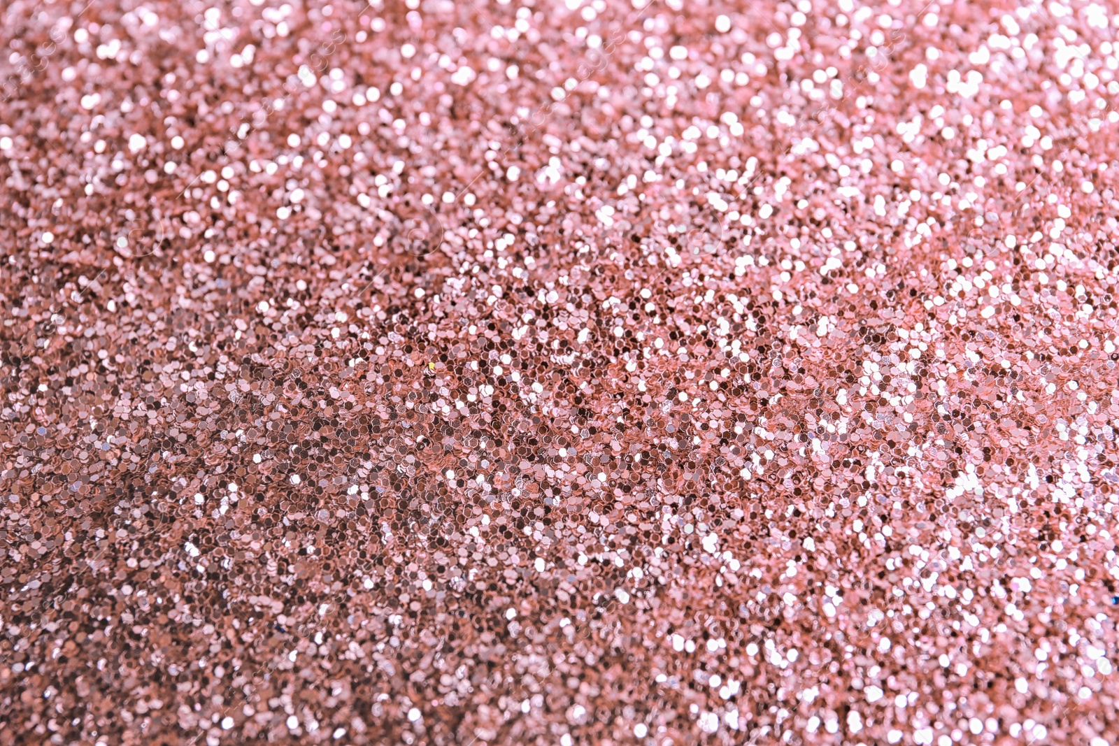 Photo of Texture of rose glitter fabric as background