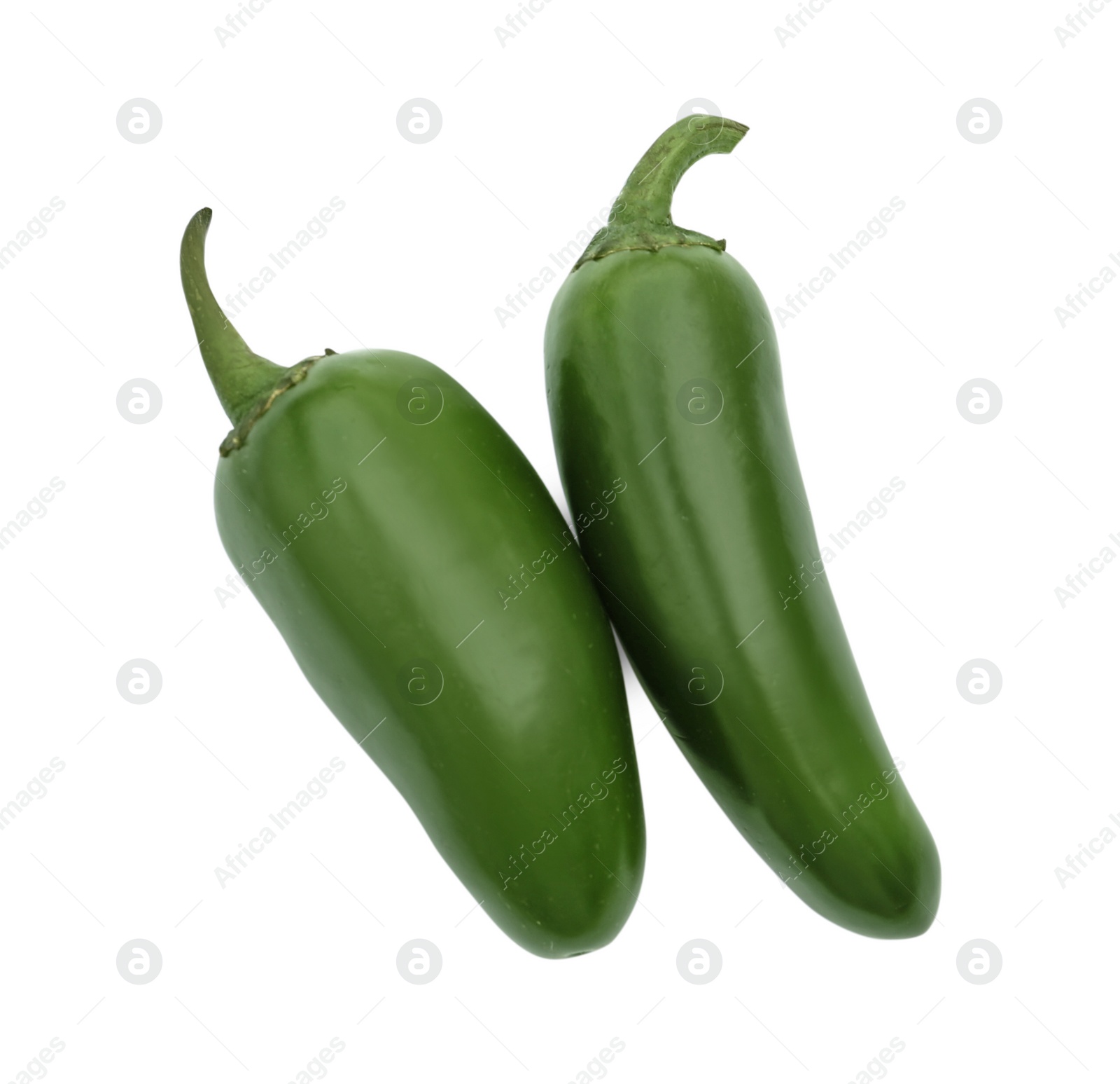 Photo of Green hot chili peppers isolated on white, top view