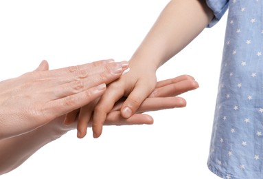 Photo of Mother applying ointment on her daughter's hand against white background, closeup