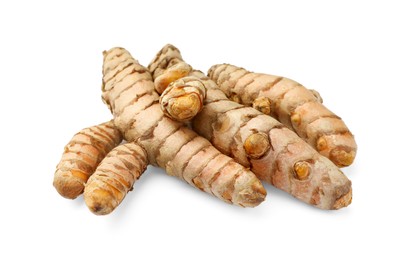 Photo of Fresh whole turmeric roots isolated on white
