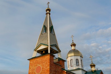 Photo of Beautiful view of village church against blue sky