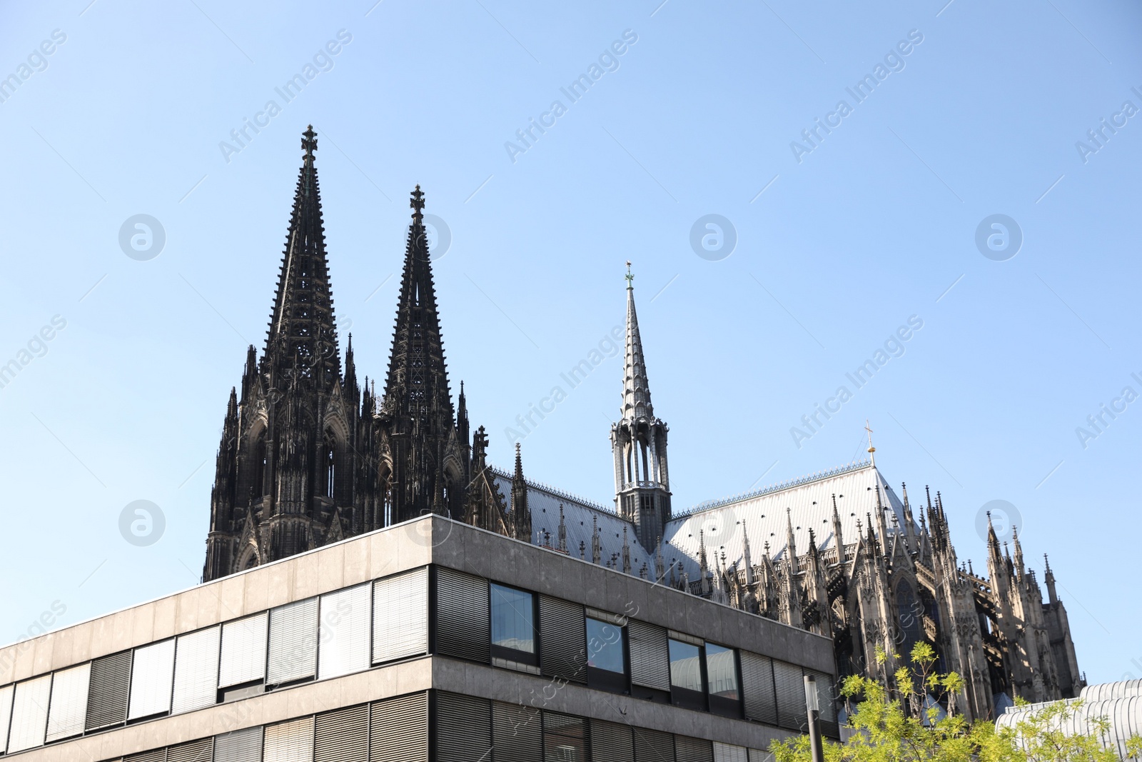 Photo of Cologne, Germany - August 28, 2022: Beautiful old gothic cathedral against blue sky