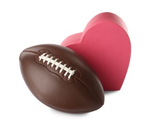 American football ball and heart box on white background