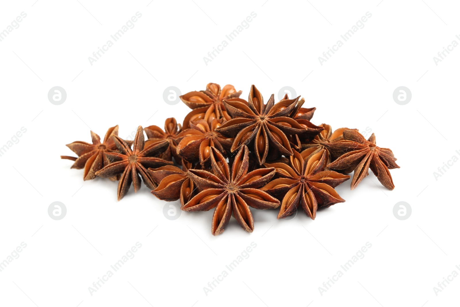 Photo of Dry anise stars with seeds on white background