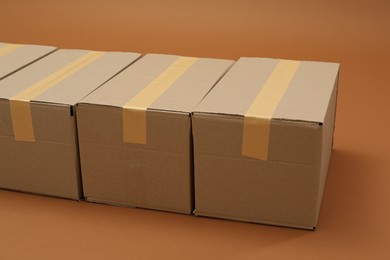 Photo of Groupcardboard boxes on brown background