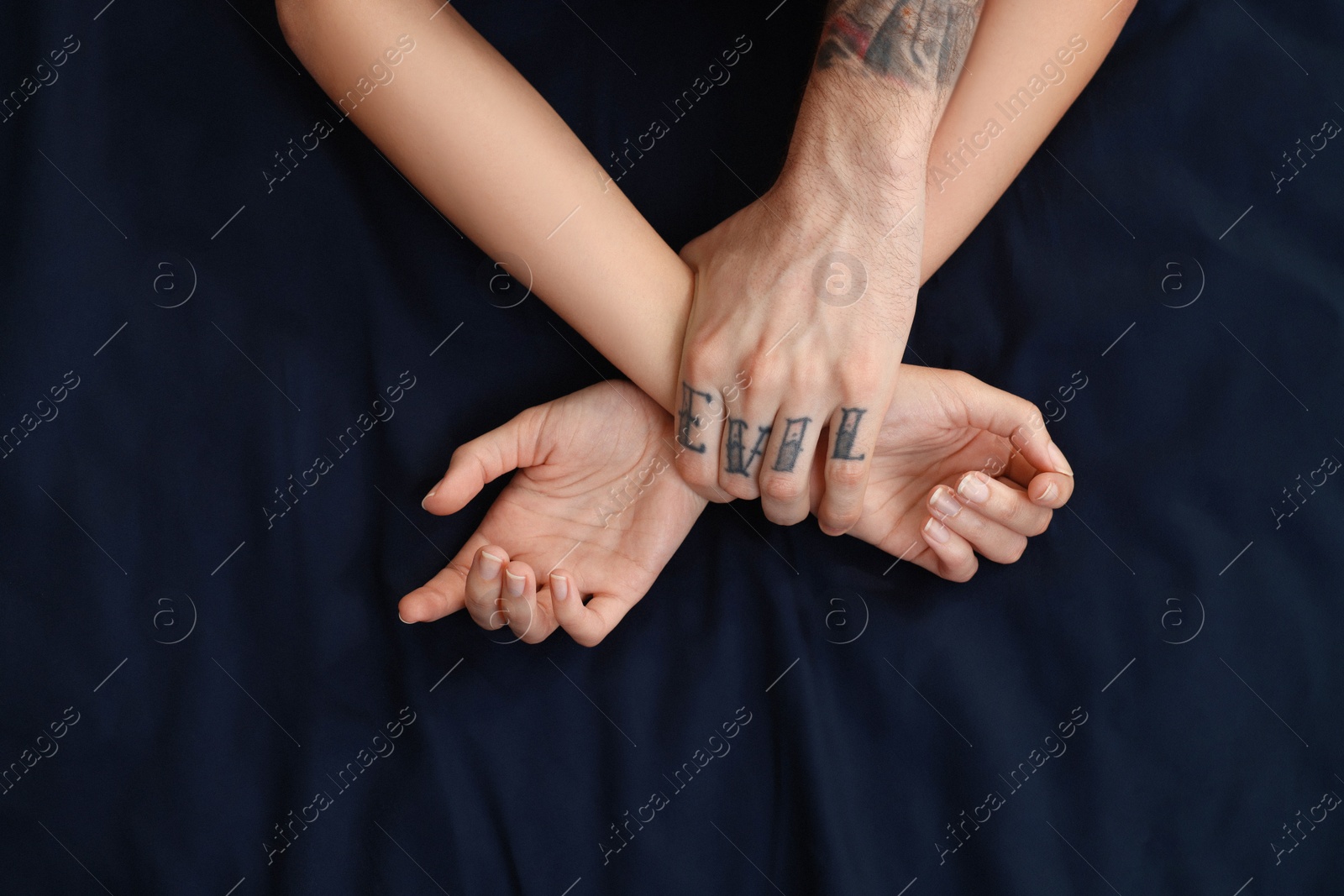 Photo of Passionate couple having sex on bed, top view
