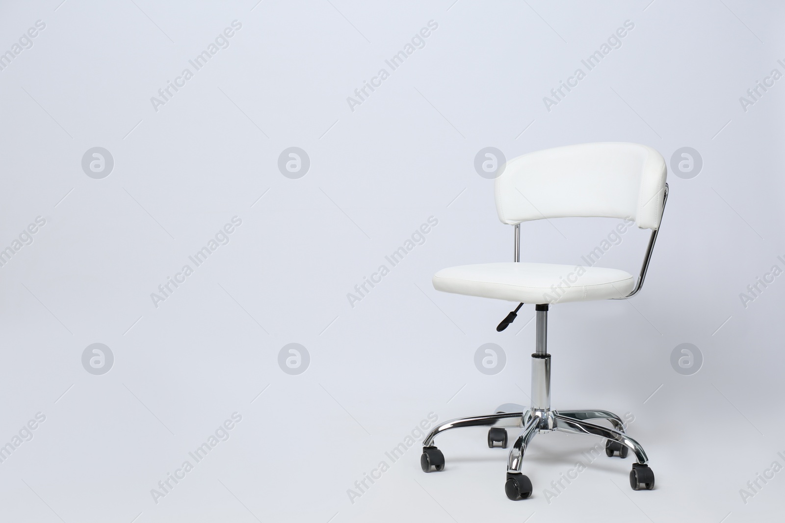 Photo of Comfortable office chair on white background, space for text