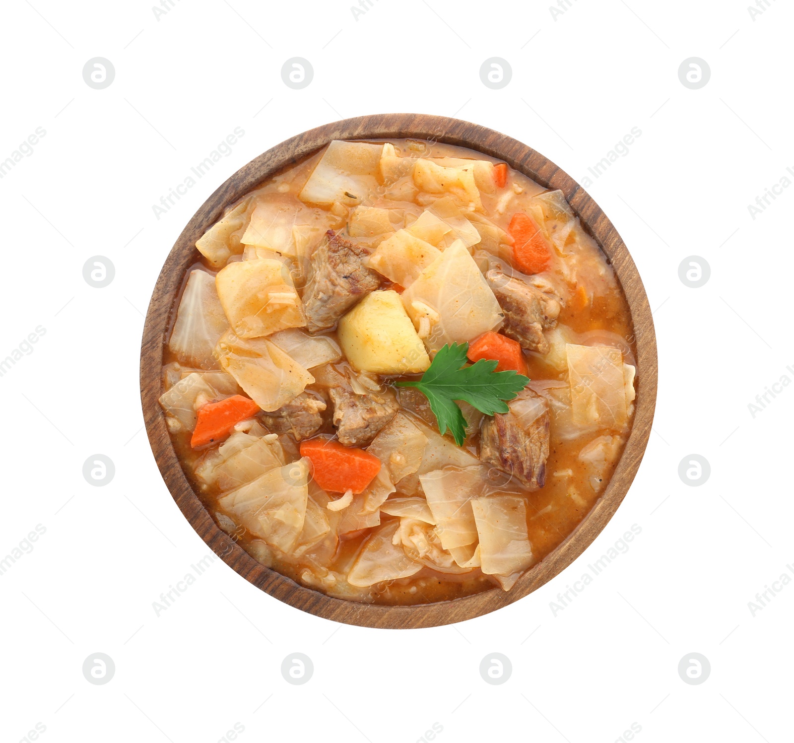Photo of Tasty cabbage soup with meat, carrot and parsley on white background, top view