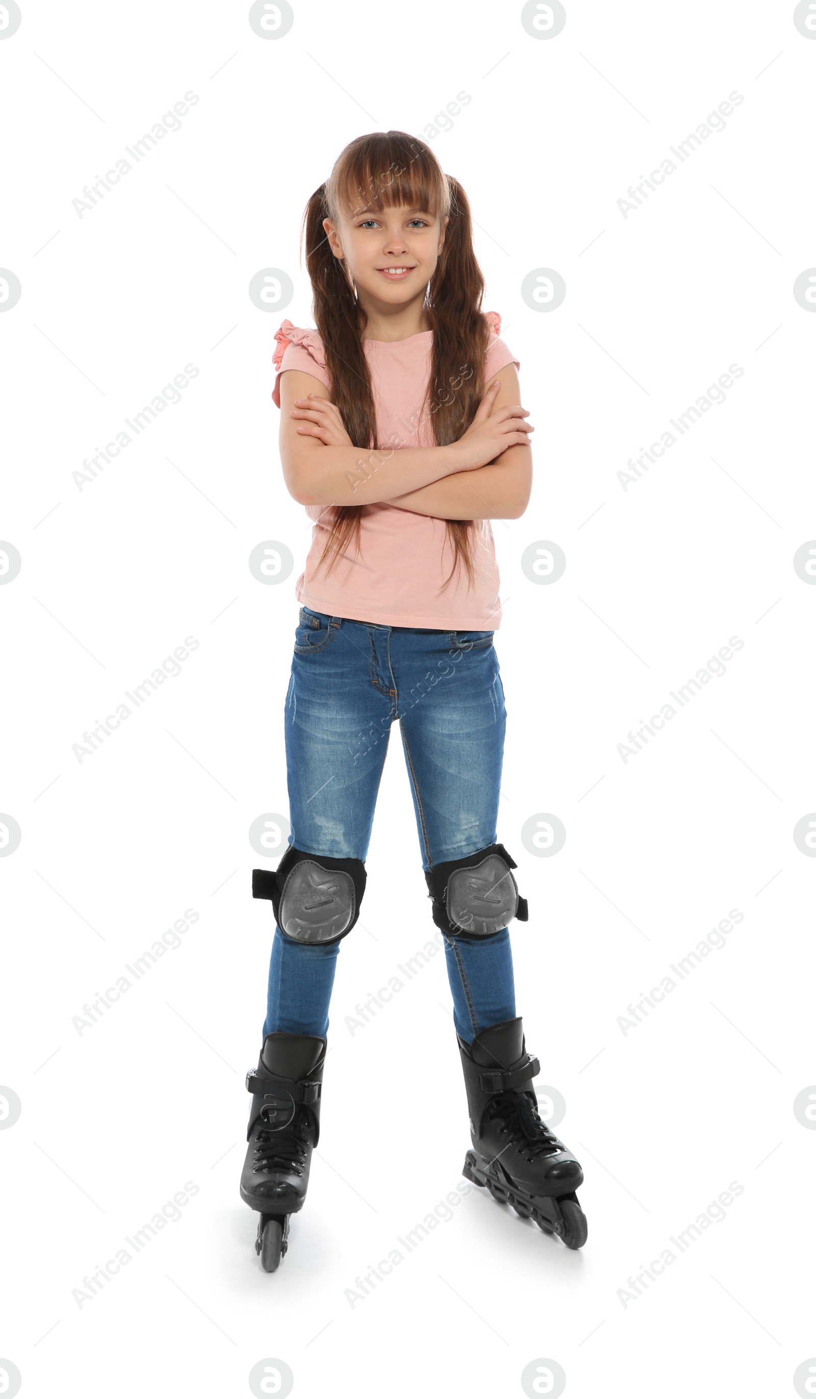 Photo of Full length portrait of girl with inline roller skates on white background