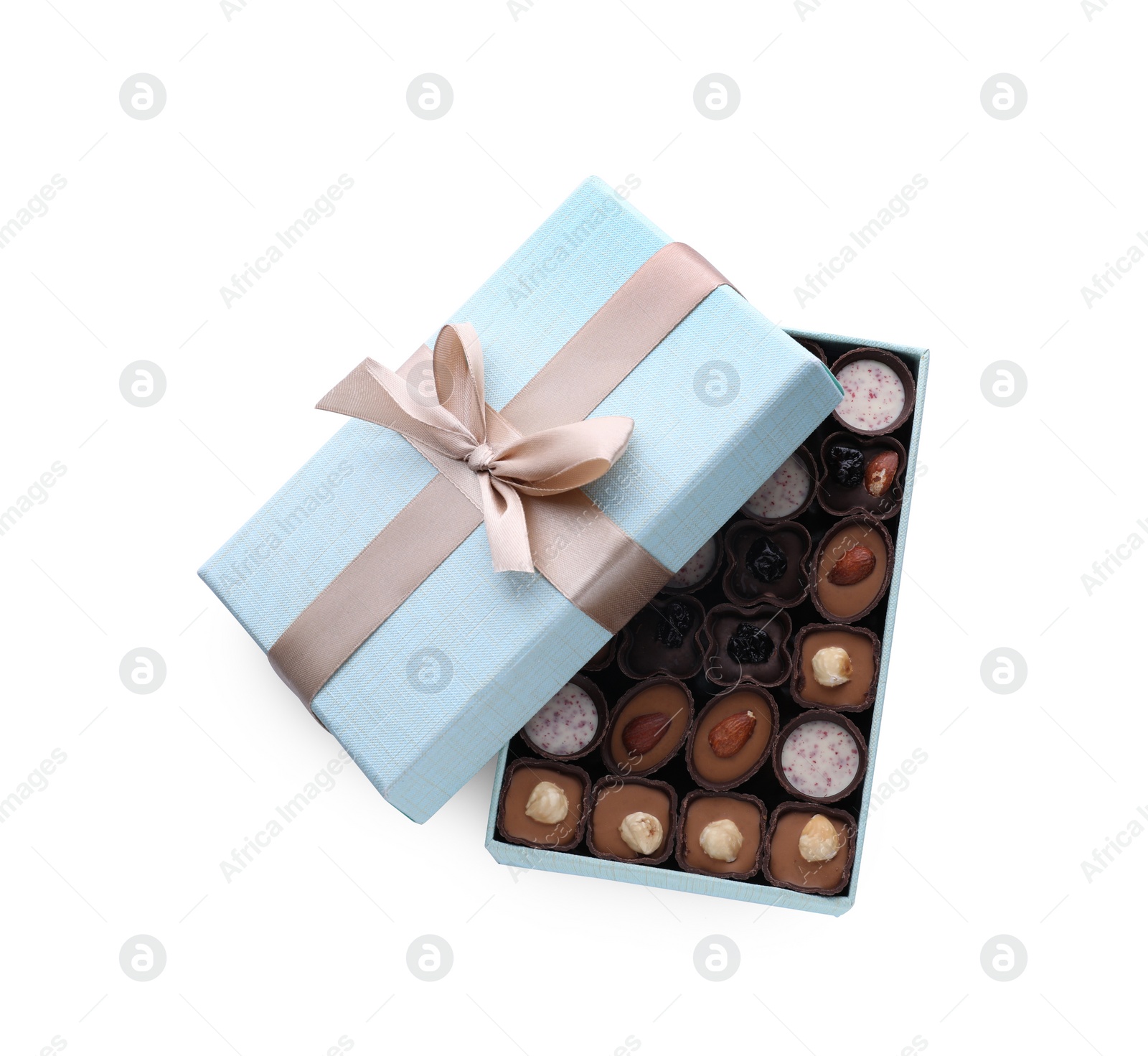 Photo of Box of delicious chocolate candies isolated on white, top view