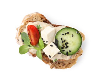 Tasty vegan sandwich with tofu, cucumber, tomato and sesame seeds isolated on white, top view