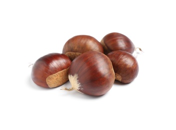 Photo of Fresh sweet edible chestnuts on white background