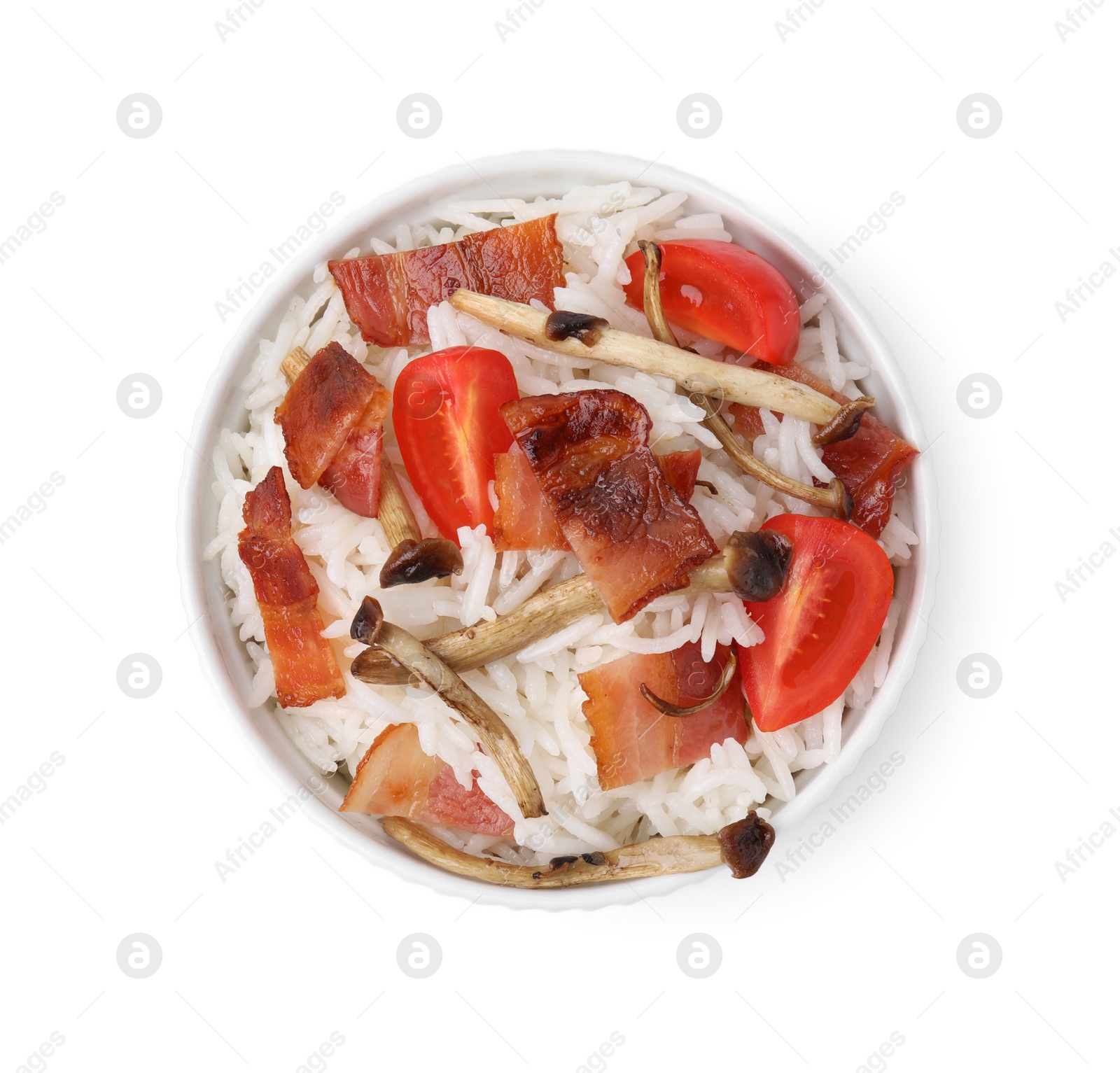 Photo of Delicious rice with bacon, mushrooms and tomatoes isolated on white, top view