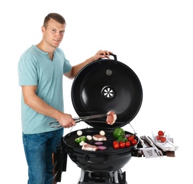 Photo of Man cooking on barbecue grill, white background