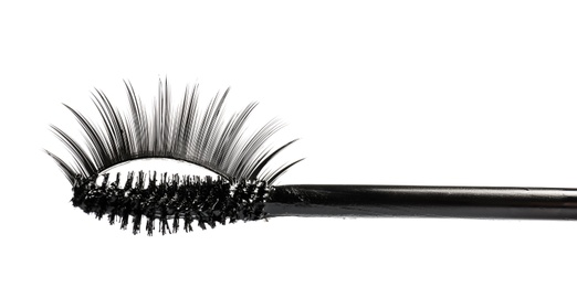 Mascara brush with false eyelashes on white background