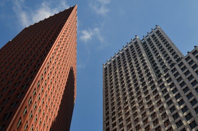 Exterior of beautiful buildings against blue sky, low angle view