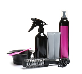 Photo of Set of professional hairdresser's tools on white background