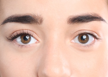 Young woman with beautiful eyelashes, closeup view