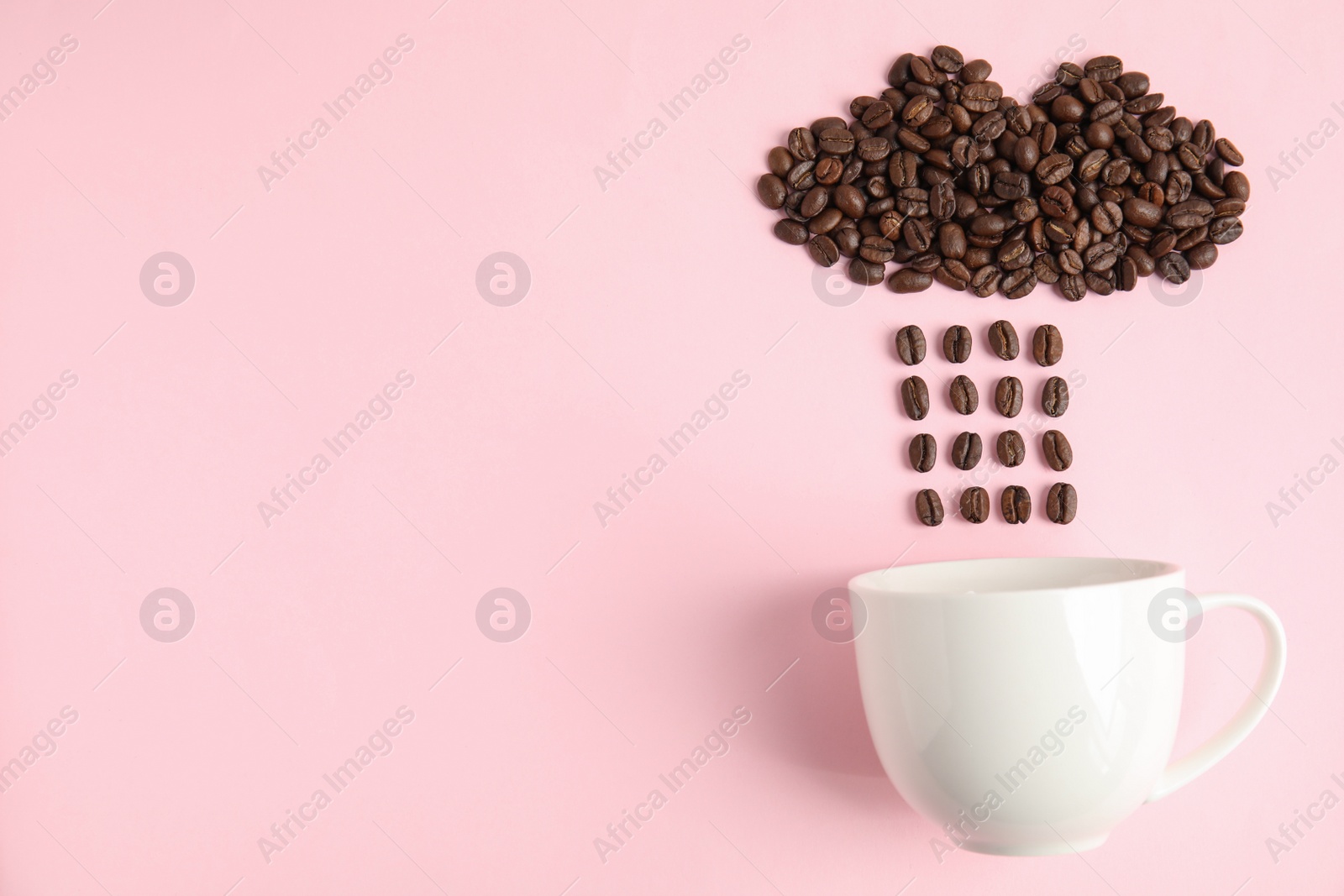 Photo of Cloud and raindrops made of coffee beans falling into cup on pink background, flat lay. Space for text