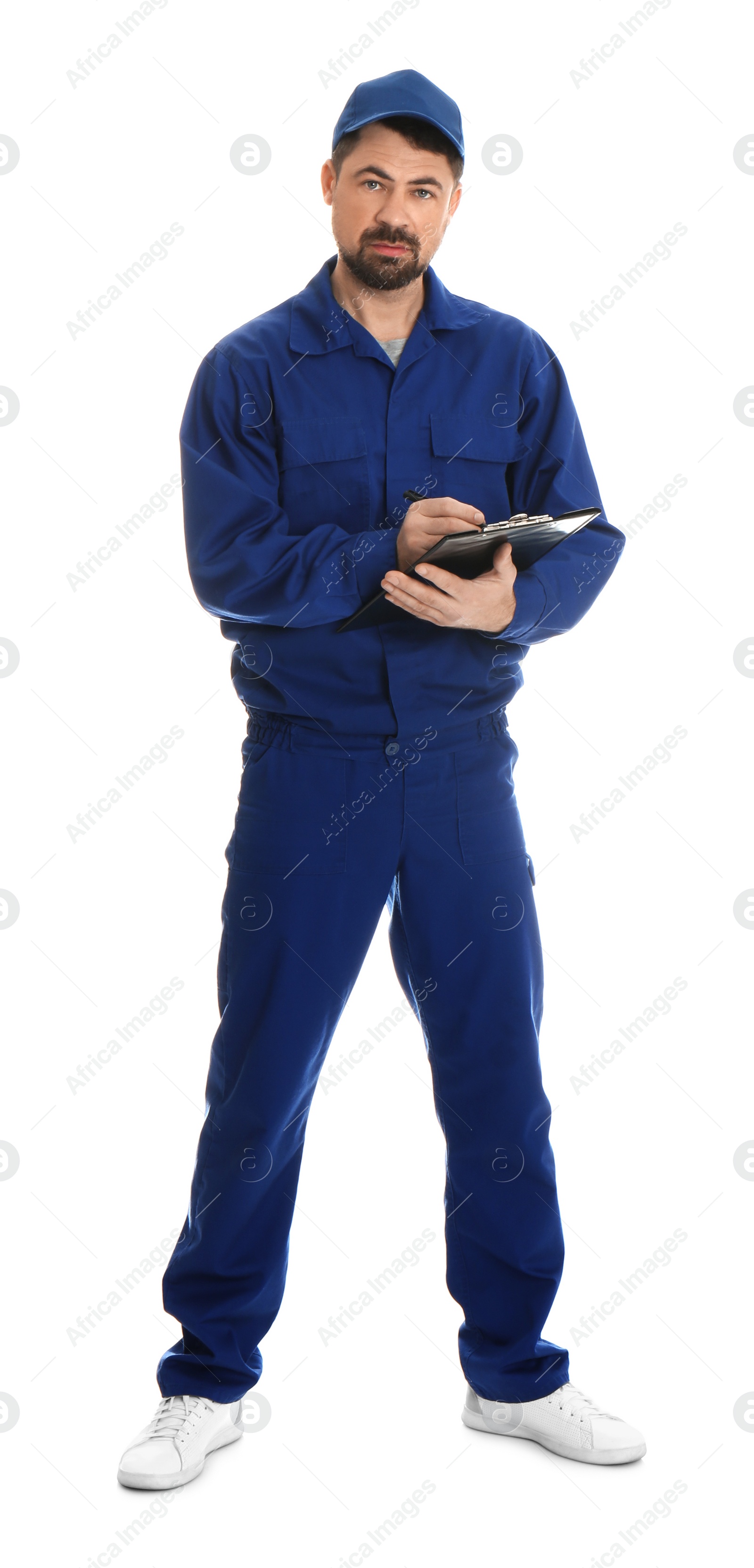 Photo of Full length portrait of professional auto mechanic with clipboard on white background
