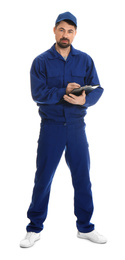 Full length portrait of professional auto mechanic with clipboard on white background