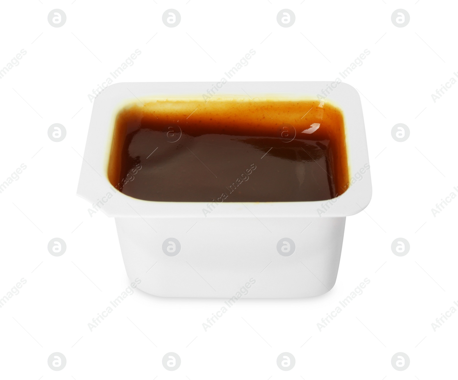 Photo of Tasty barbecue sauce in plastic container isolated on white