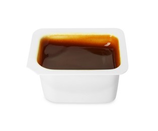 Photo of Tasty barbecue sauce in plastic container isolated on white