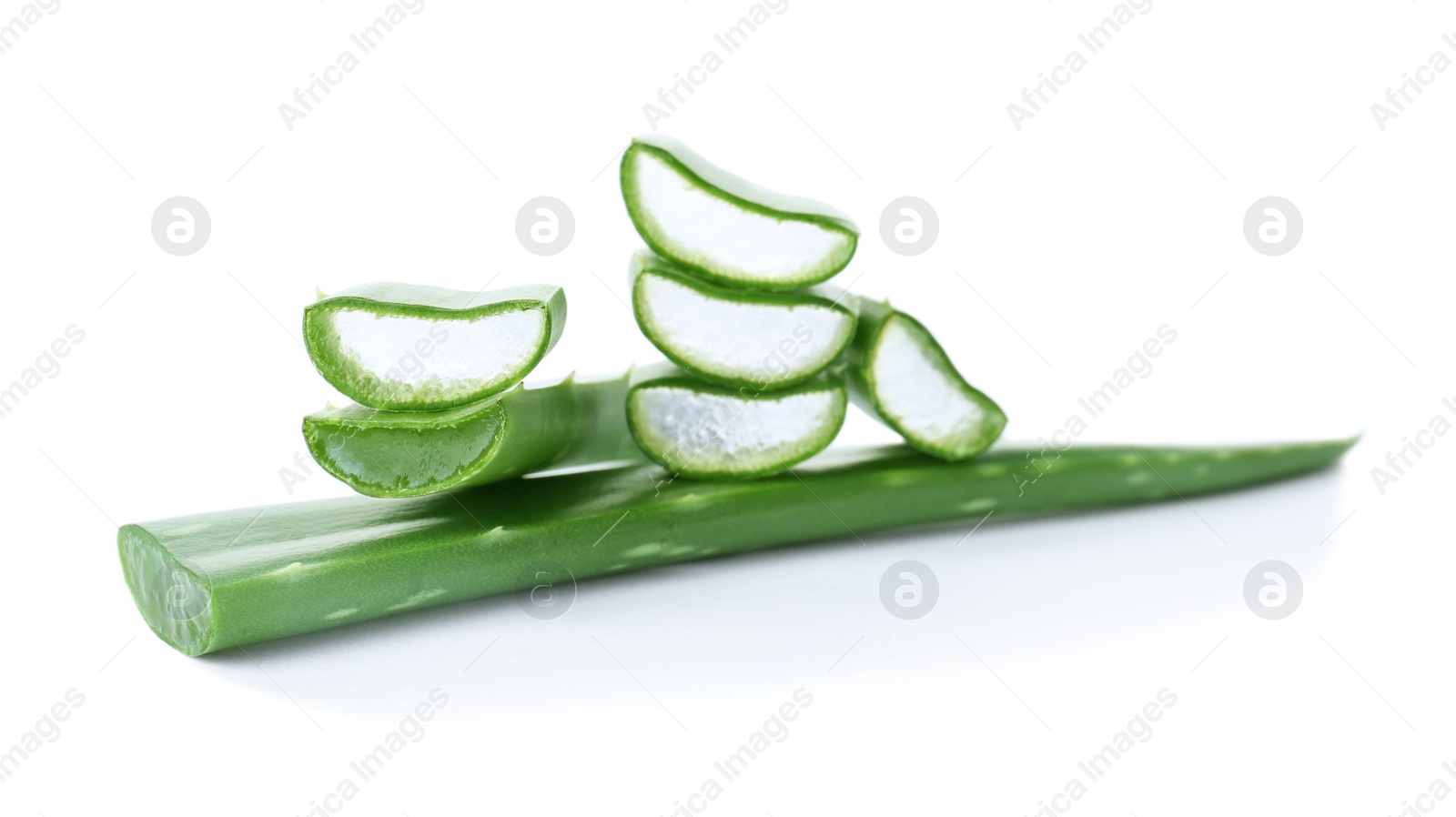 Photo of Fresh aloe vera leaf slices on white background