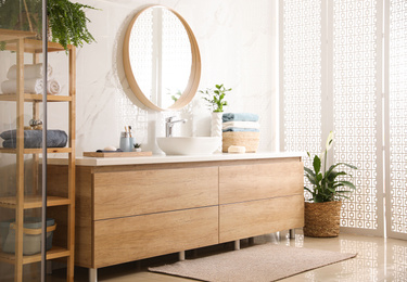 Stylish bathroom interior with mirror and countertop. Design idea