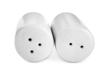 Photo of Salt and pepper shakers isolated on white