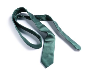 Photo of One green necktie isolated on white, above view