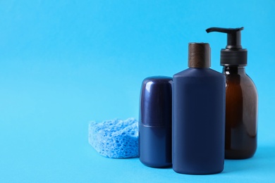 Photo of Set of different men's cosmetic products on light blue background. Space for text