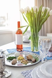 Photo of Table served for Passover (Pesach) Seder indoors