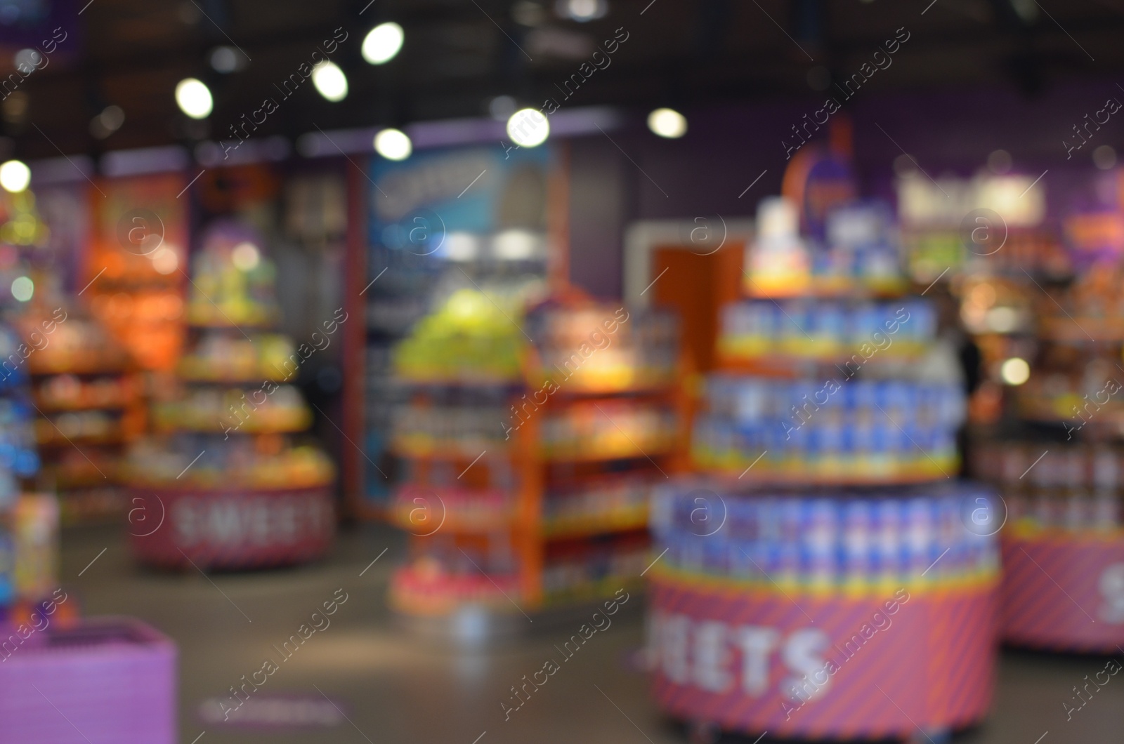 Photo of Blurred view of supermarket interior with different products