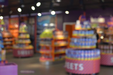 Blurred view of supermarket interior with different products