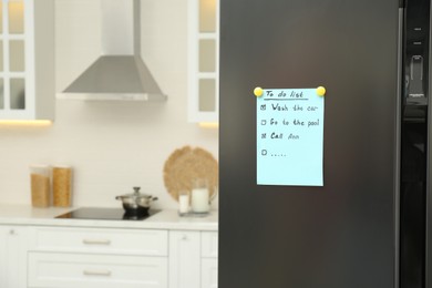 To do list on fridge in kitchen. Space for text