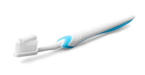 Photo of Plastic toothbrush with paste on grey background
