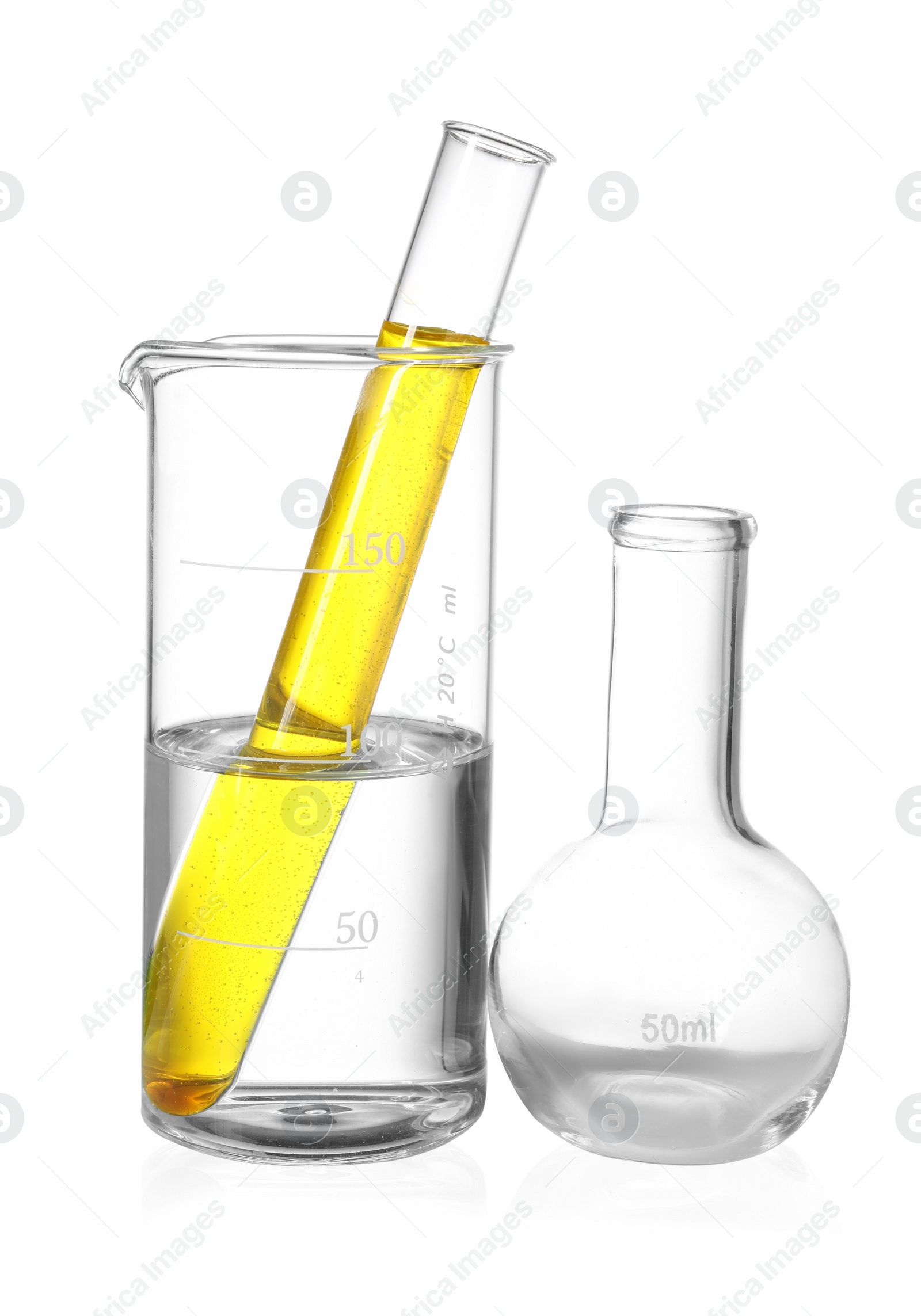 Photo of Glass flask, beaker and test tube with liquids isolated on white