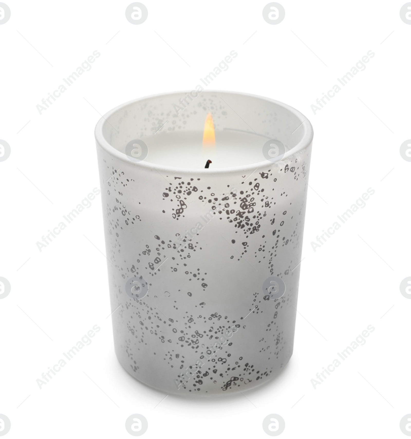 Photo of Burning wax candle in glass holder isolated on white