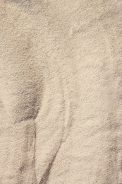 Photo of Top view of sandy beach on sunny day