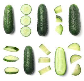 Image of Set with sliced cucumbers on white background, top view