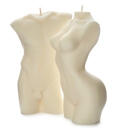 Beautiful male and female body shaped candles on white background