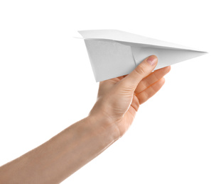 Woman holding paper plane on white background, closeup