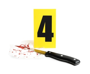 Photo of Bloody knife, napkin and crime scene marker with number four isolated on white