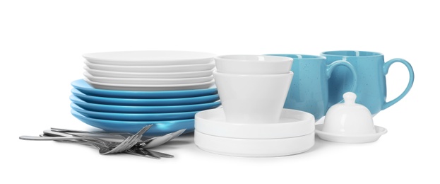 Set of clean tableware on white background. Washing dishes