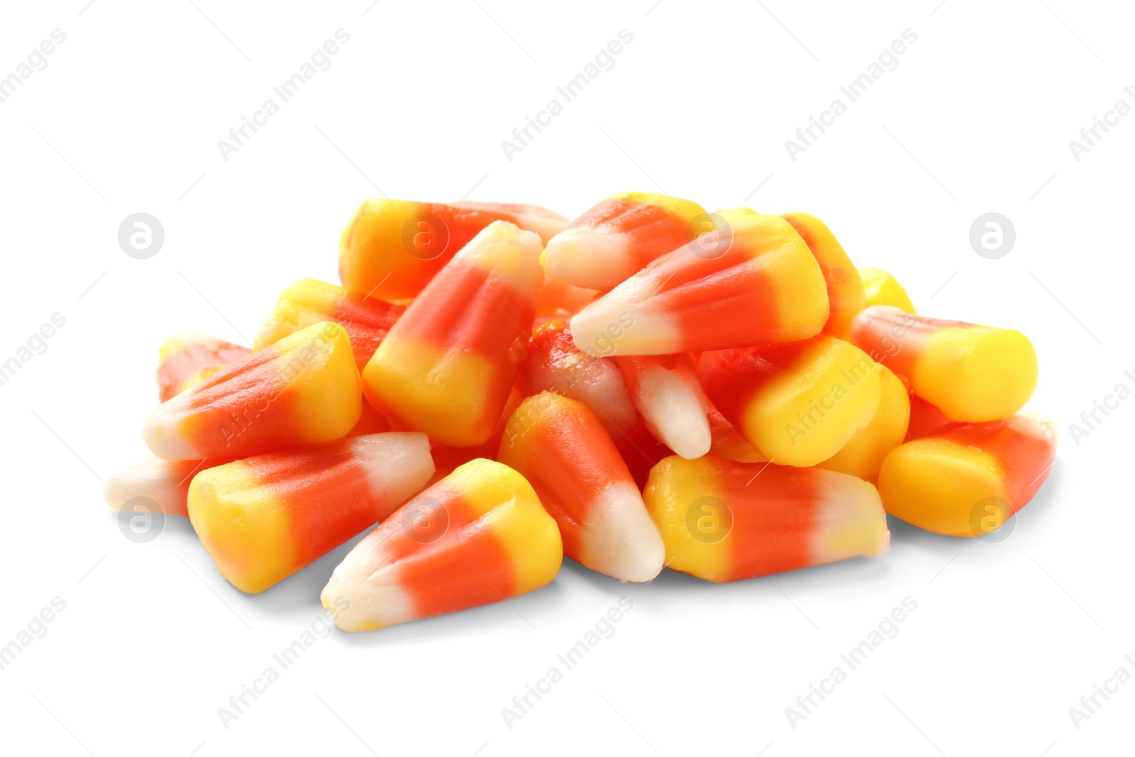 Photo of Colorful candy corns for Halloween party on white background