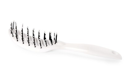 One new plastic hairbrush isolated on white