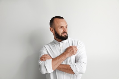 Photo of Portrait of handsome man on white background