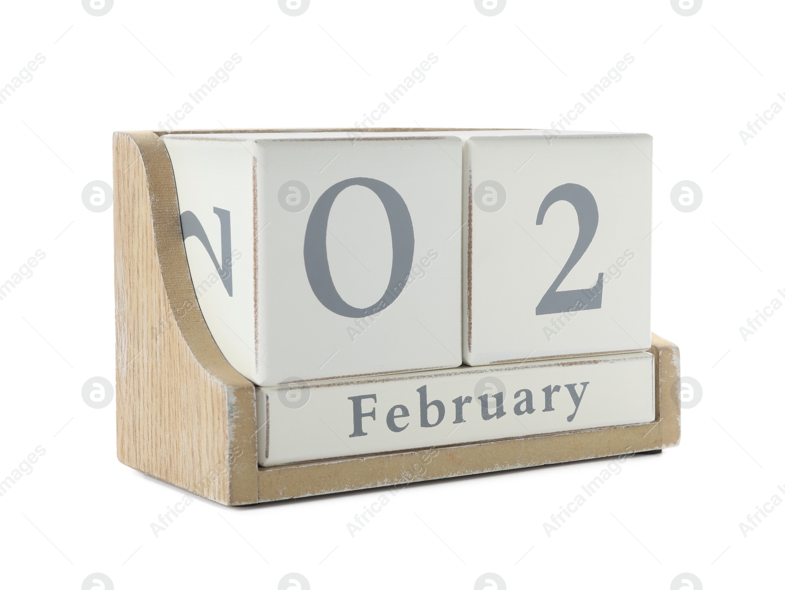 Photo of Wooden block calendar with date February 2nd on white background. Groundhog day