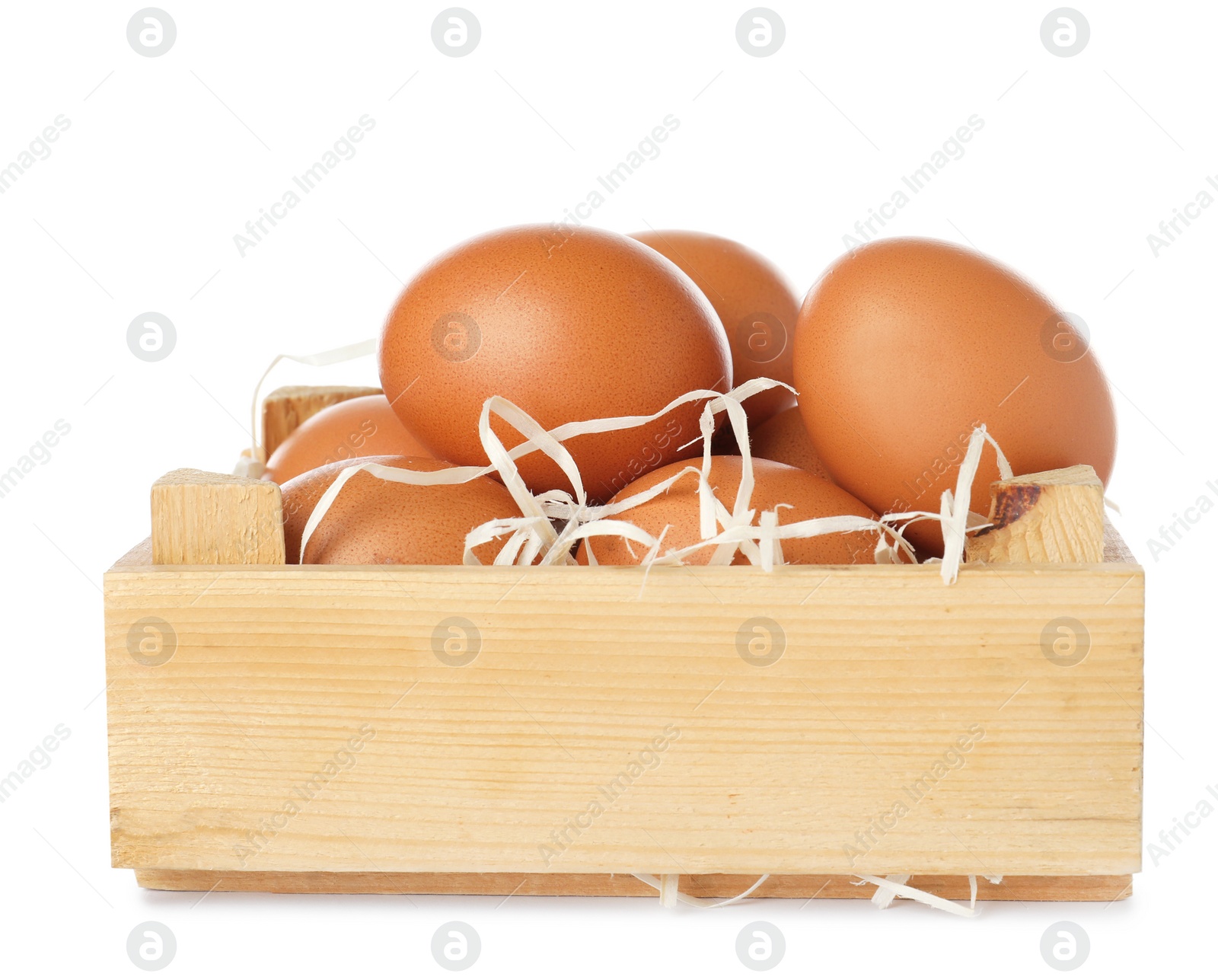 Photo of Wooden crate full of fresh eggs on white background